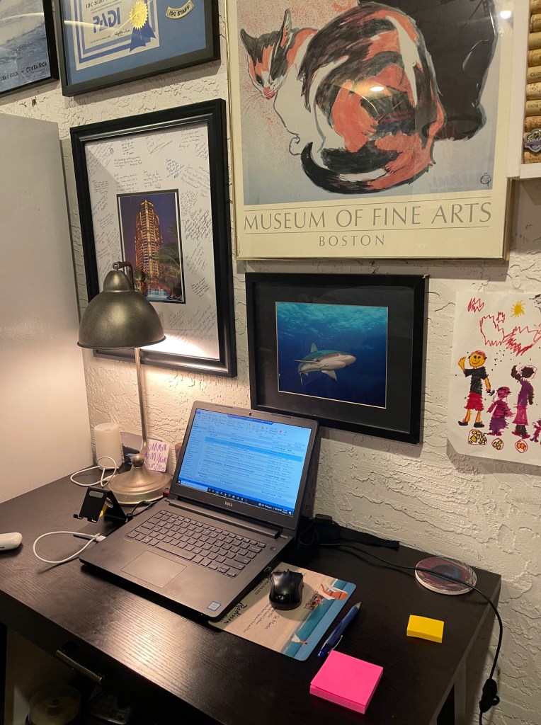 Computer on a desk, ready for writing